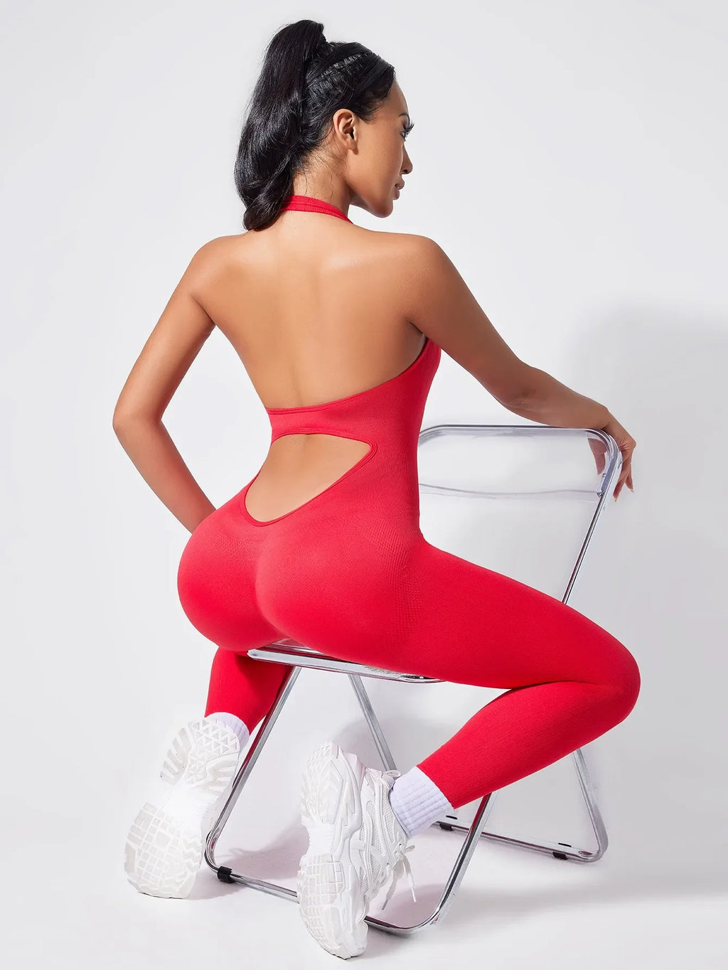 Ladies Vibrant Red Backless Hanging Neck Jumpsuit for Fitness and Fashionable Daily Wear