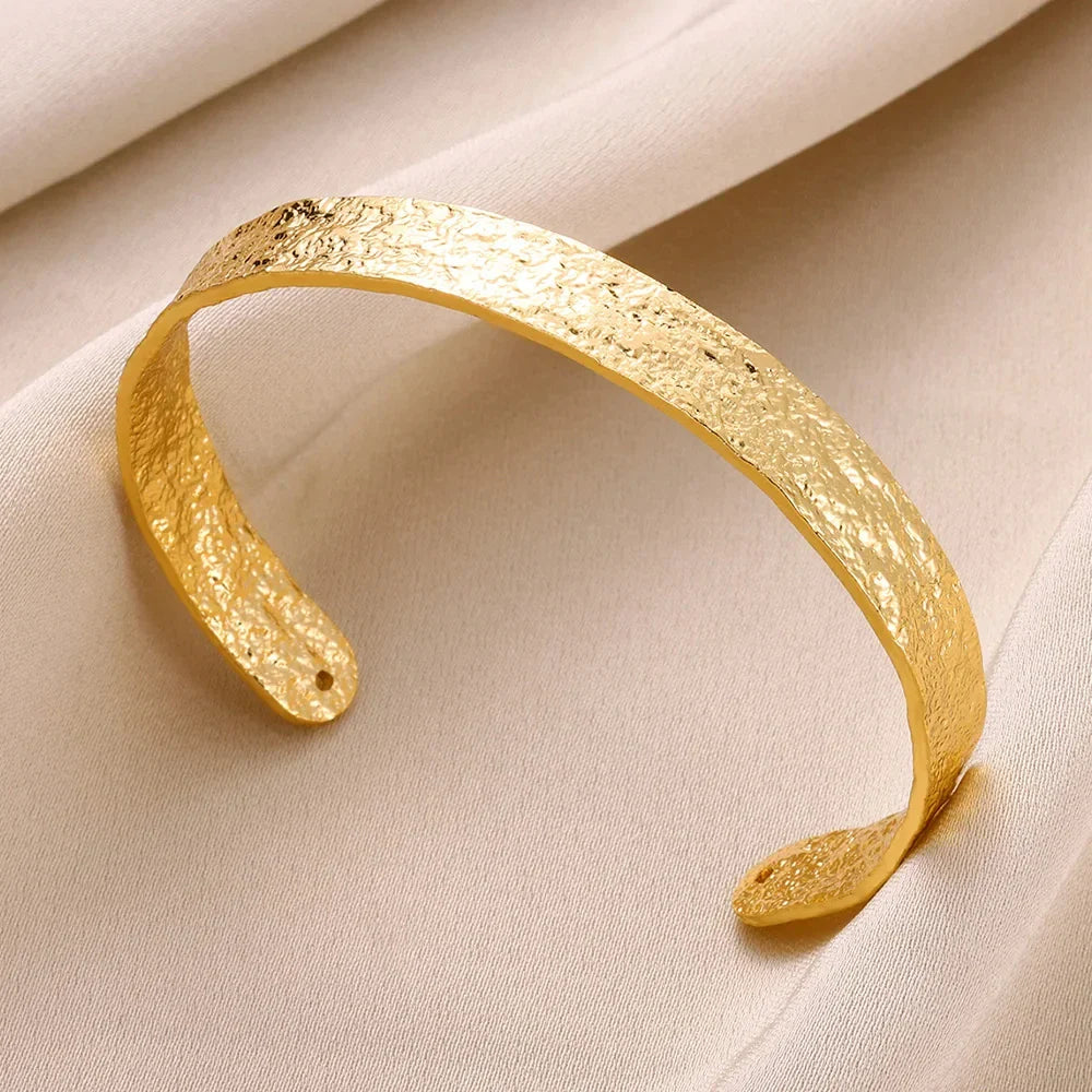 Elegant Gold Stainless Steel Bangle Bracelet with Classic Bump Pattern for Women