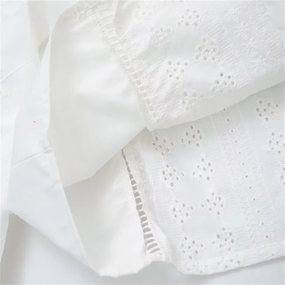 Women's Single Breasted Round Neck Lantern Sleeve Embroidered Hollow Shirt with Elegant Design and Slimming Fit