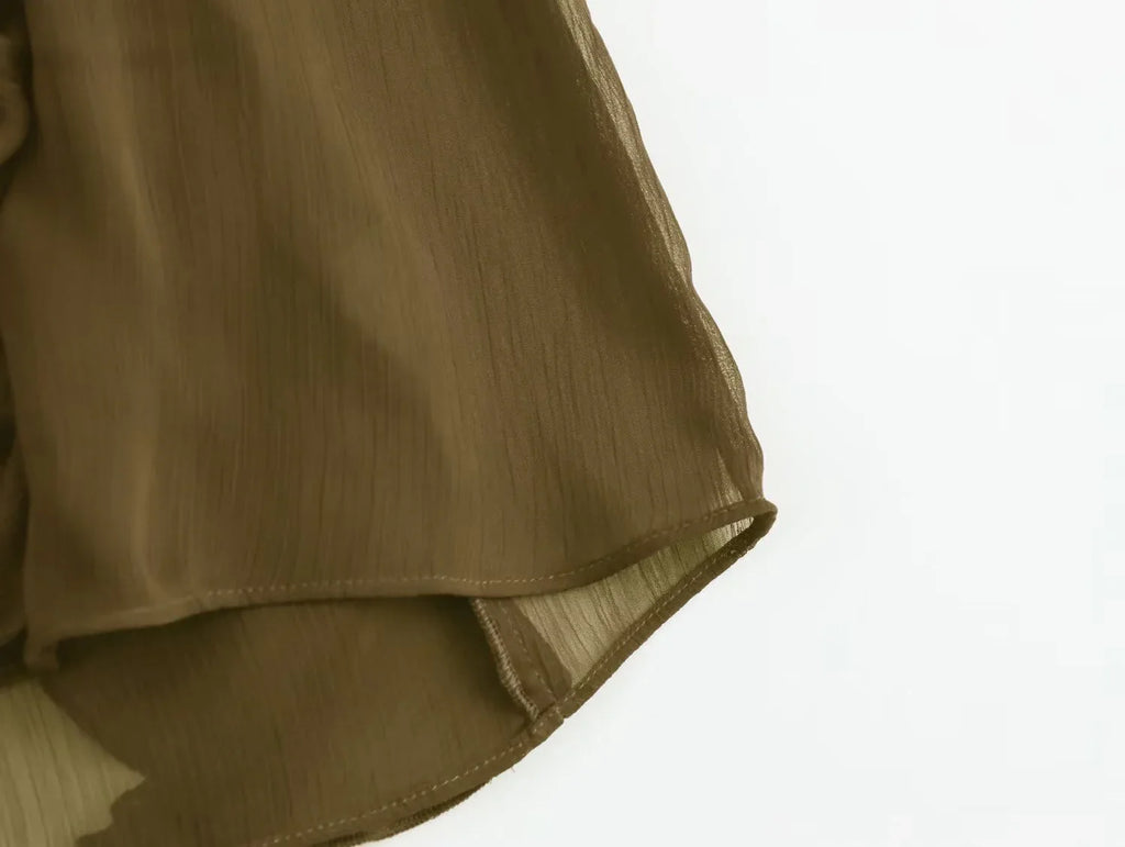 Elegant Women's V-Neck Layered Decorative Shirt with Chic Temperament Design