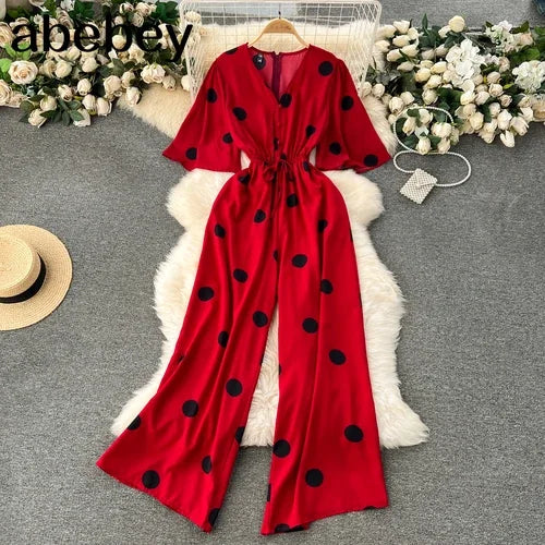 Women Wide Leg Polka Dot Jumpsuit with V Neck Dolman Sleeves and Slim Waist Design