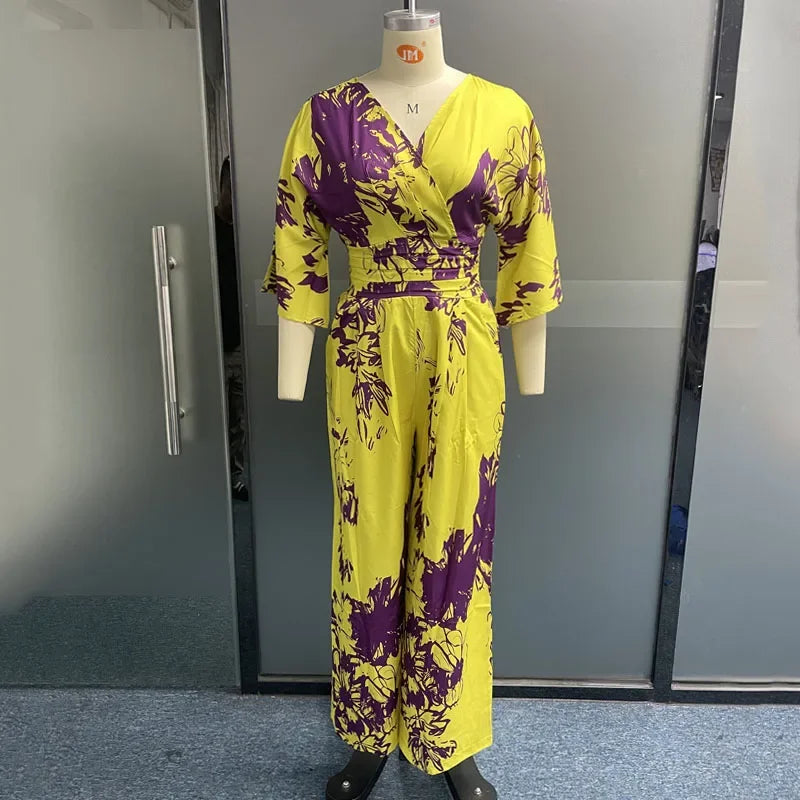 Women's Summer Casual Printed Jumpsuit with Short Bat Sleeves V Neck Backless Design Tie Waist and Wide Leg Pants Romper