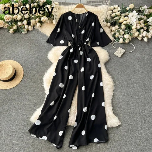 Women Wide Leg Polka Dot Jumpsuit with V Neck Dolman Sleeves and Slim Waist Design