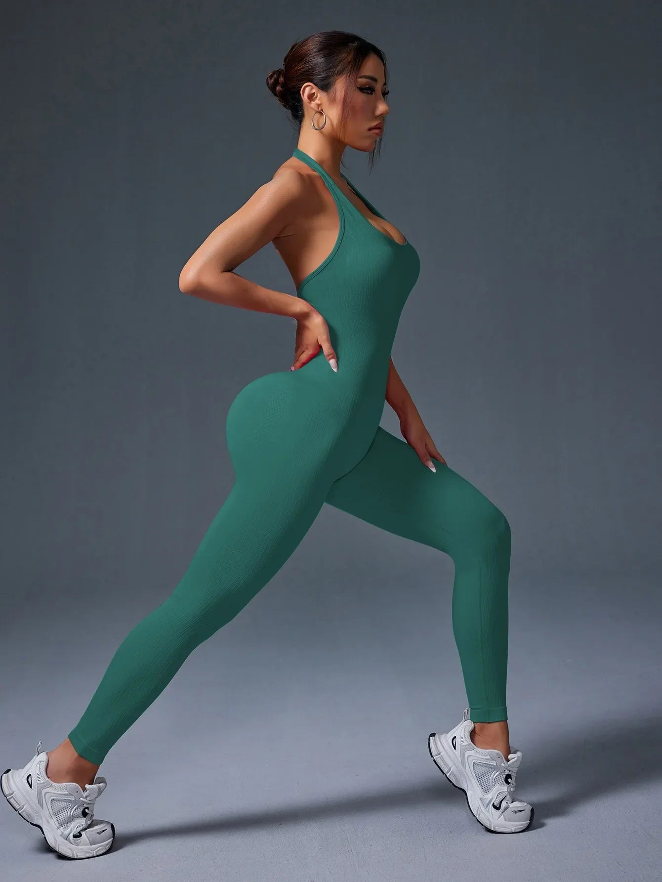 Ladies Green Ribbed Fitness Jumpsuit with Exposed Back and Neck Design for Stylish Activewear