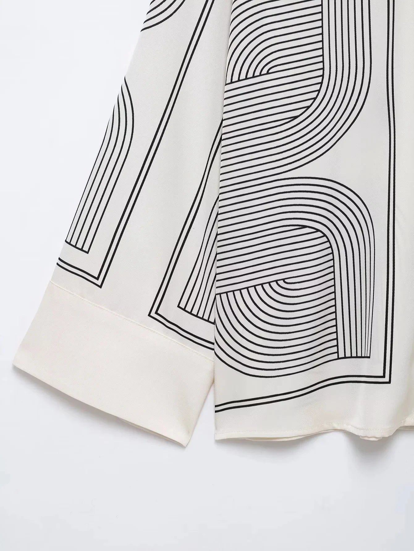 Stylish Women's Suit Set with Long Sleeve Shirt and Wide Leg Pants in Creamy Base and Geometric Patterns