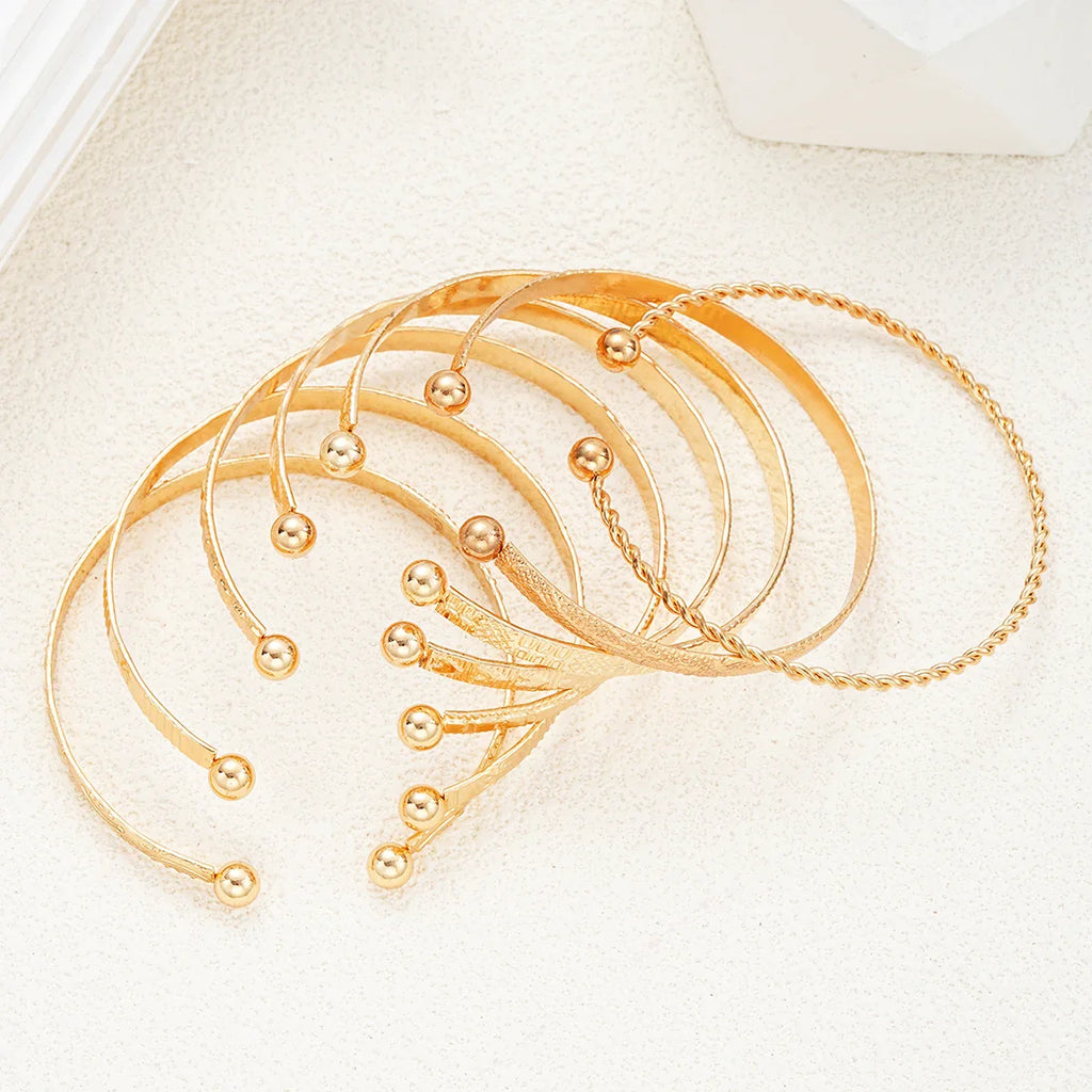 7 Piece Punk Gold Color Bracelet Set for Women with Heart Prints Metal Design Open Bangle Fashion Jewelry Gifts
