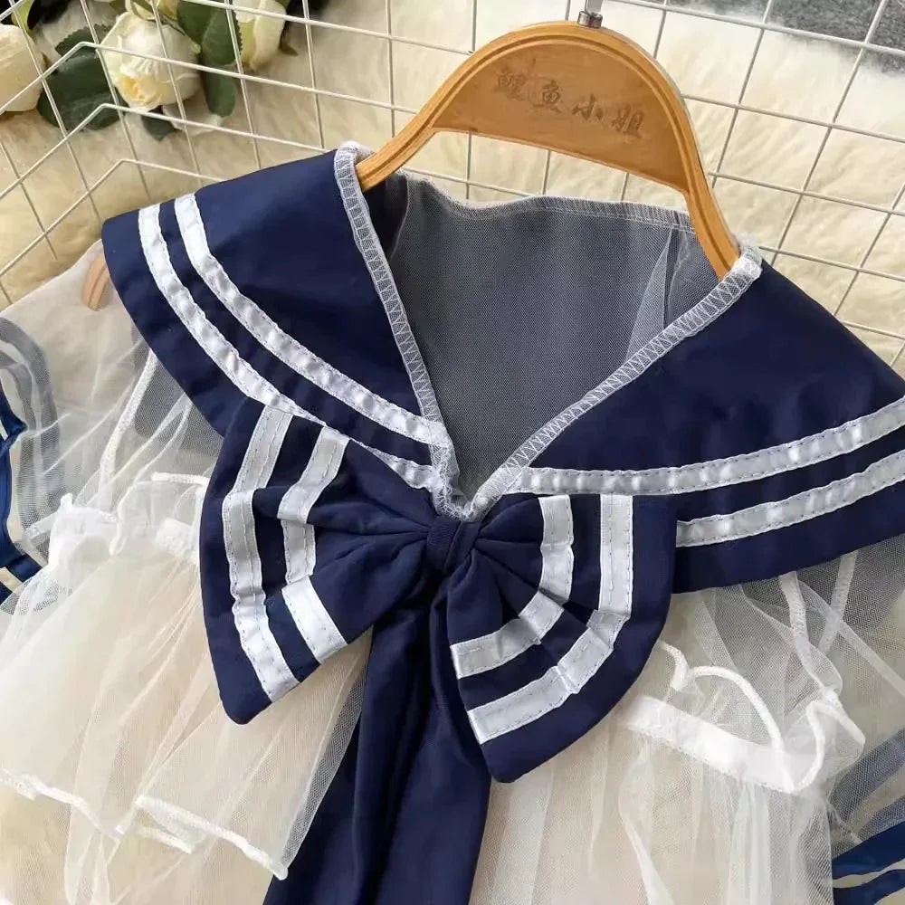 Women's Sexy Transparent Sailor Student Uniform Cosplay Costume Sheer Bowknot Stripe Patchwork Top with Mini Skirt Two-Piece Set