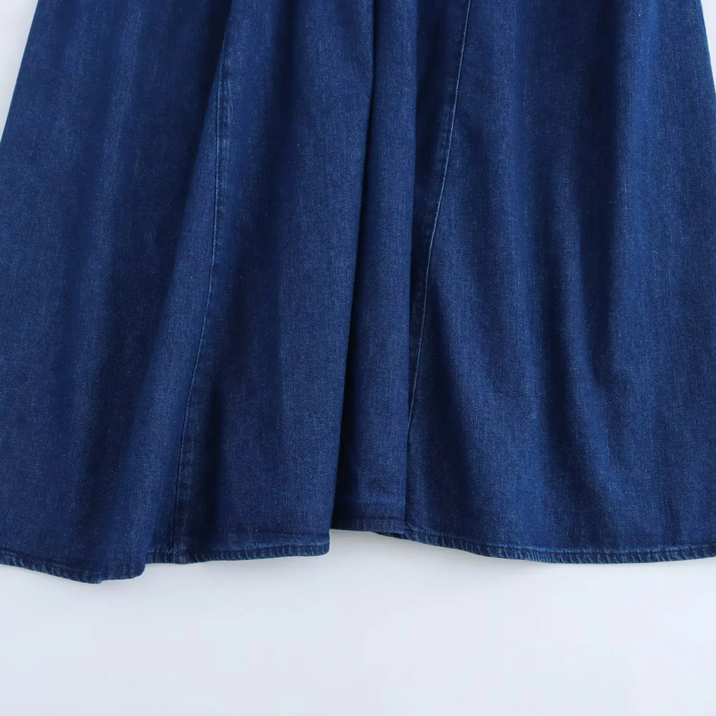 Strapless Denim Dress With Fitted Bodice And Pleated Skirt