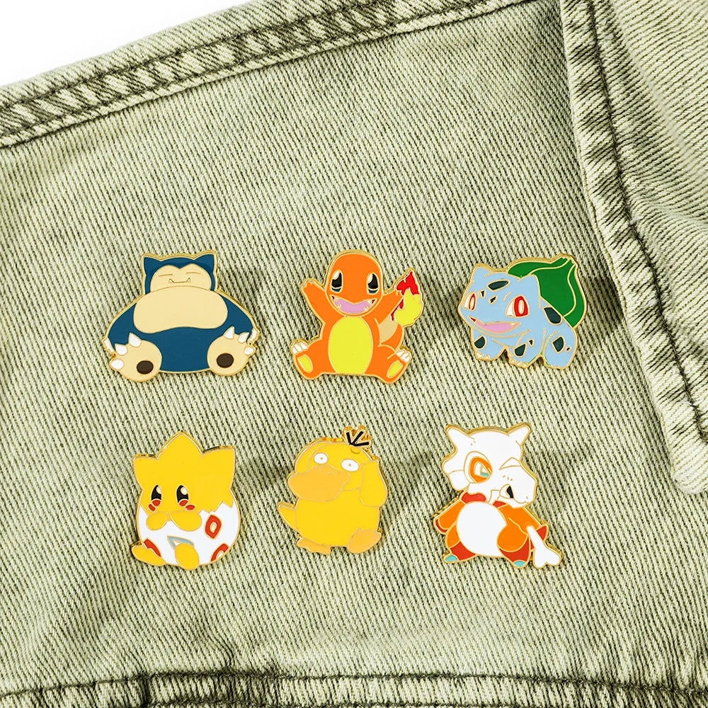 Creative 4 Piece Enamel Brooch Set Featuring Cute Game Console Pikachu Togepi and Charmander Pins for Wallet Backpack and Clothing