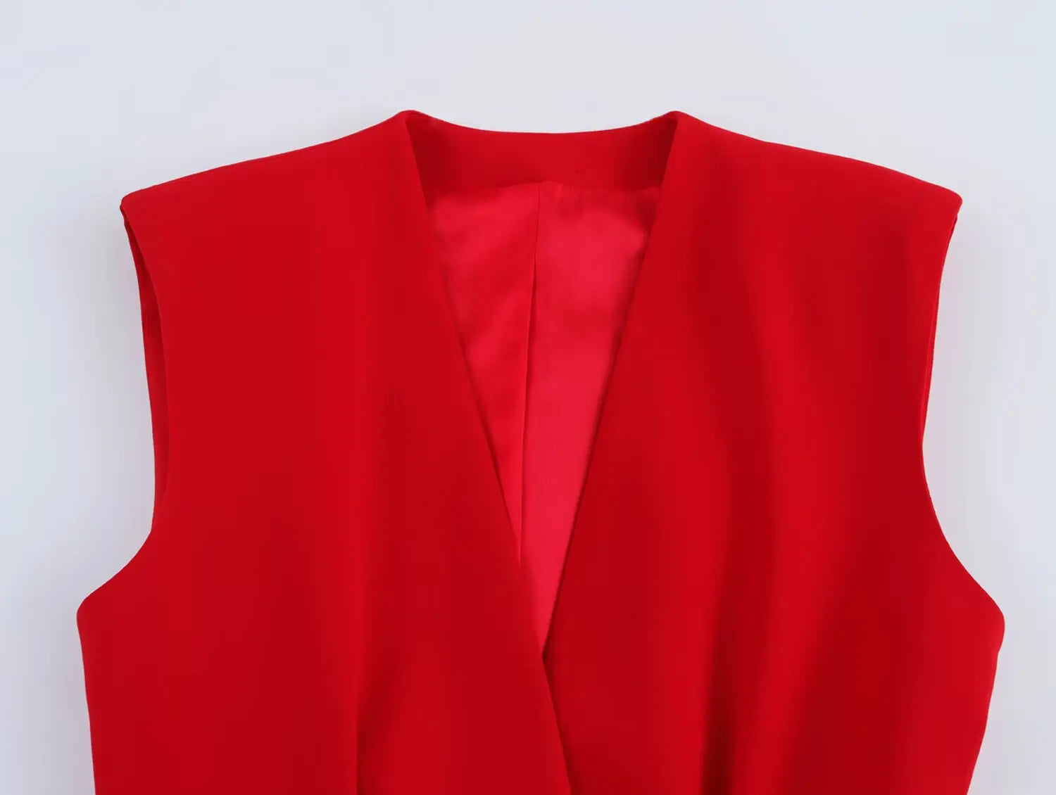 Women's Belted V-neck Vest Top with Shoulder Pads and Pockets Paired with Flared Pants for Casual Spring Summer Chic Look