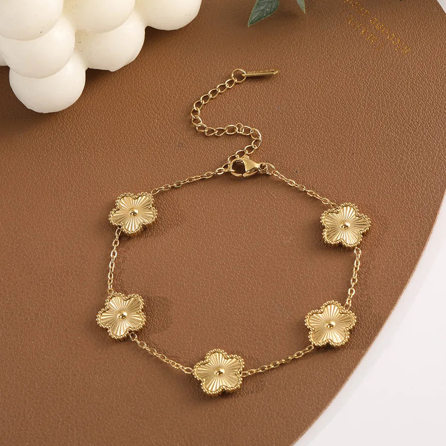 Minimalist 18K Gold Plated Flower Bracelet for Women with Plum Blossom Design and Cuban Chain for Daily Wear Jewelry Gift