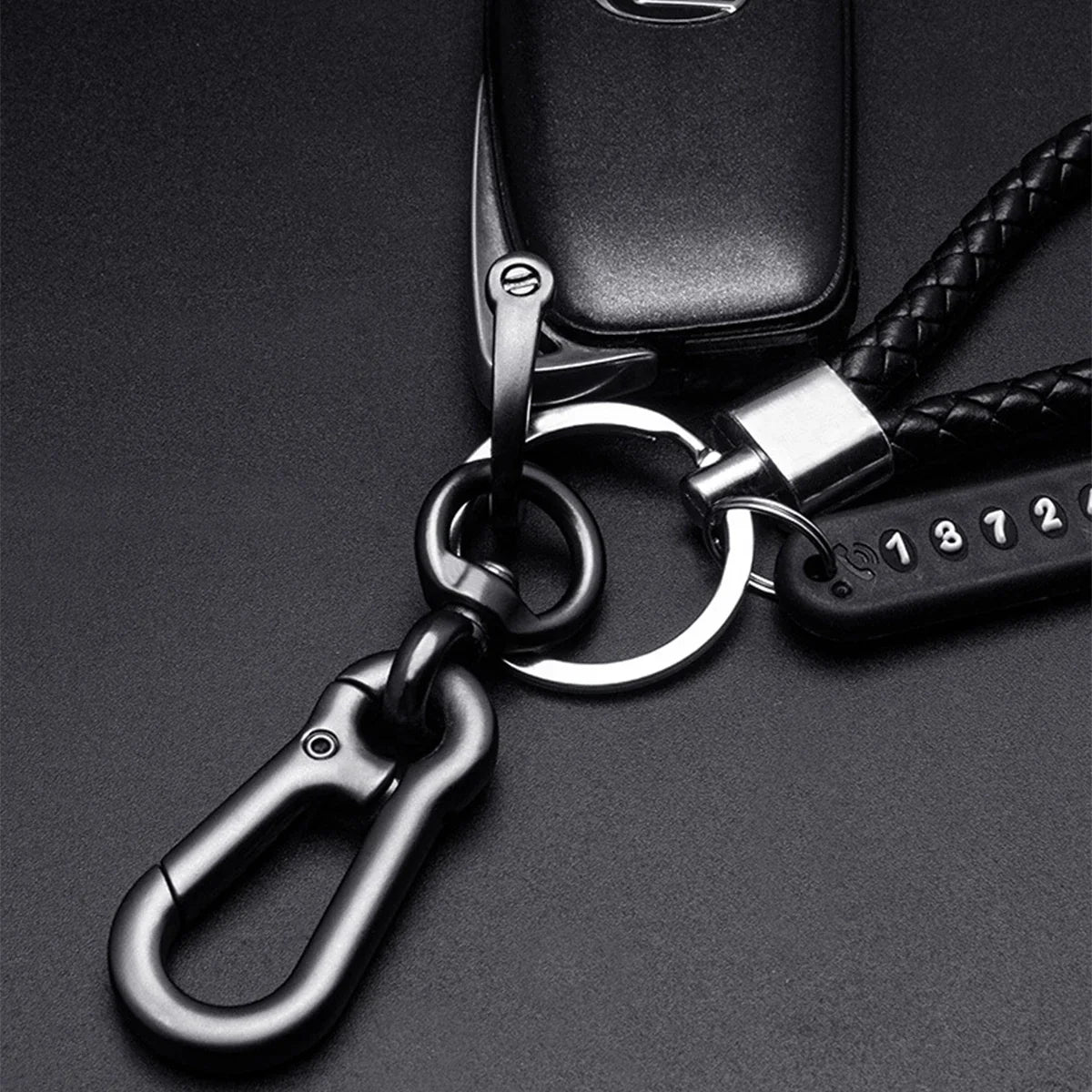 Trendy DIY Mobile Phone Number Plate Keychain for Men with Woven Leather Rope and Anti-Lost Design