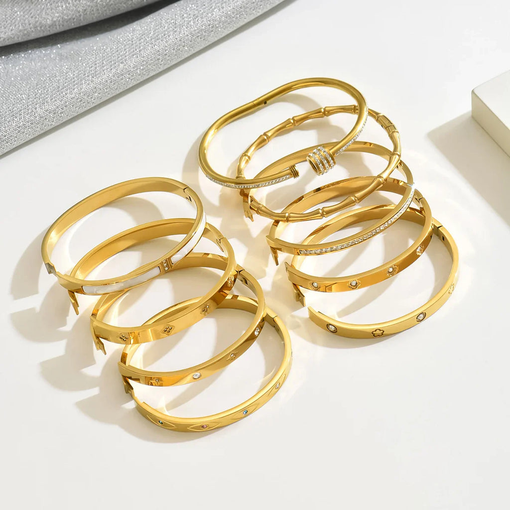 Stainless Steel Four-Leaf Clover Lucky Bracelet for Women Stylish Gold Nail Bangle