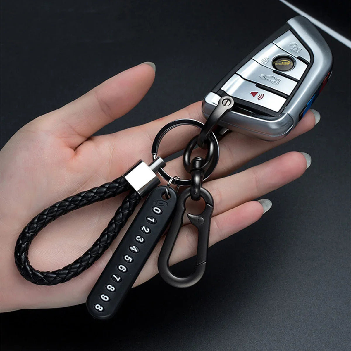 Trendy DIY Mobile Phone Number Plate Keychain for Men with Woven Leather Rope and Anti-Lost Design