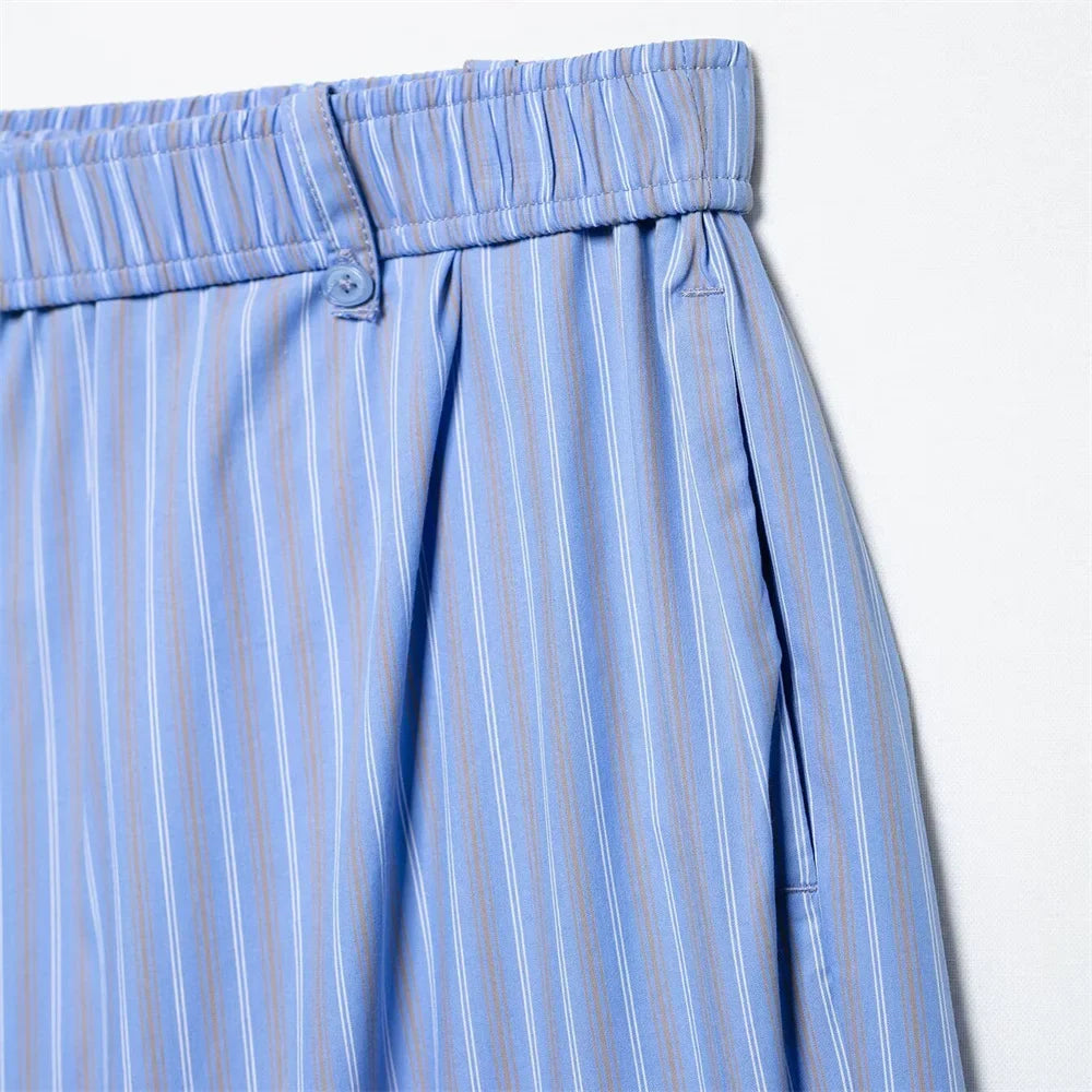 Womens Light Blue Pinstripe Suit Set with Sleeveless Asymmetric Vest and Wide Leg Pants for Stylish Office Attire