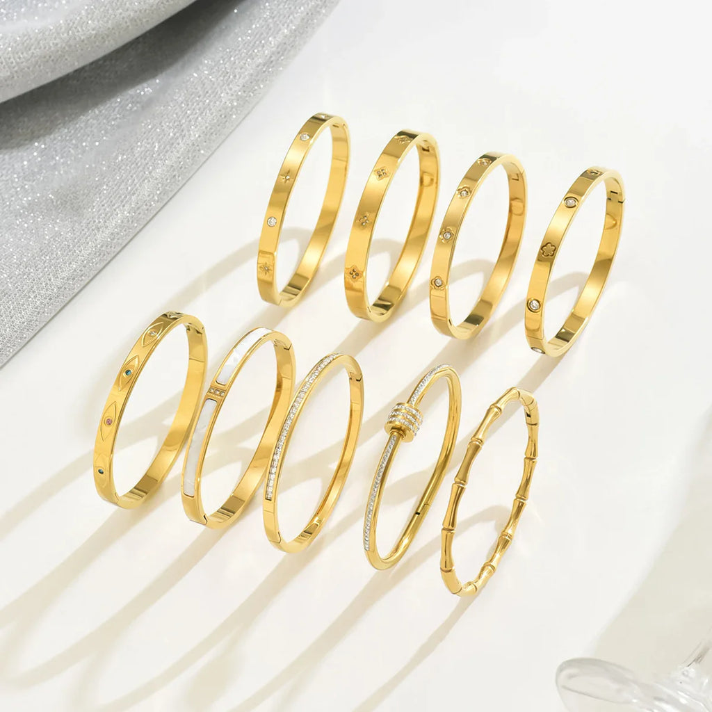 Stainless Steel Four-Leaf Clover Lucky Bracelet for Women Stylish Gold Nail Bangle