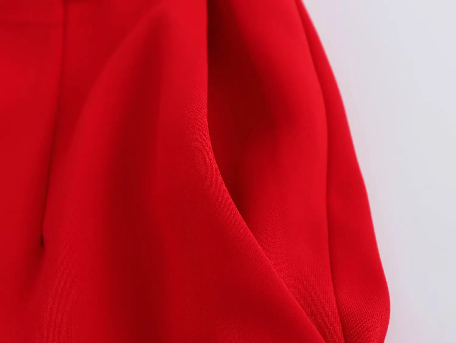 Women's Belted V-neck Vest Top with Shoulder Pads and Pockets Paired with Flared Pants for Casual Spring Summer Chic Look