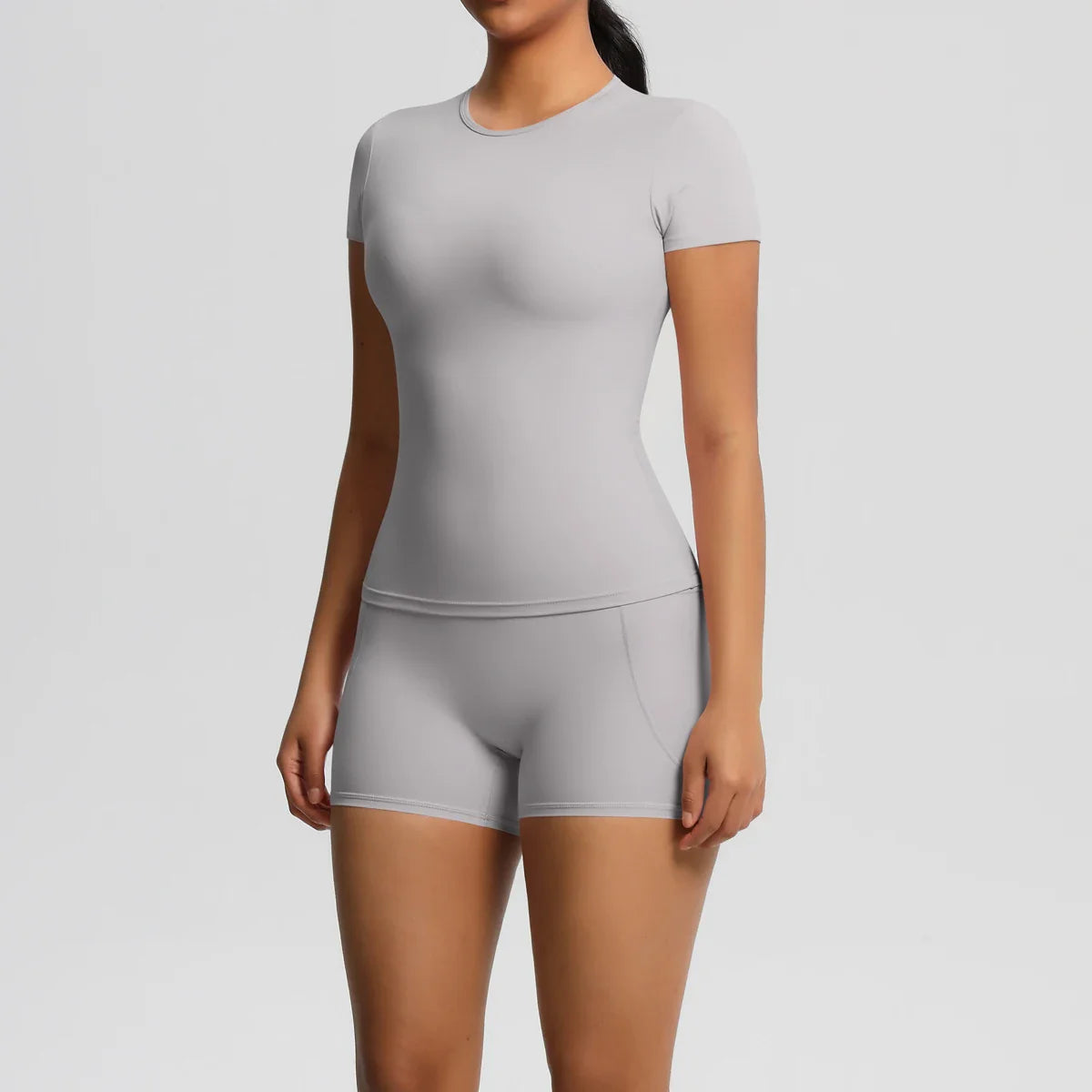 2PCS Women's Yoga Set with Pocketed Shorts and Short Sleeve Crop Top Sports Bra Comfortable Fitness Tracksuit Activewear for Gym and Outdoor Workouts