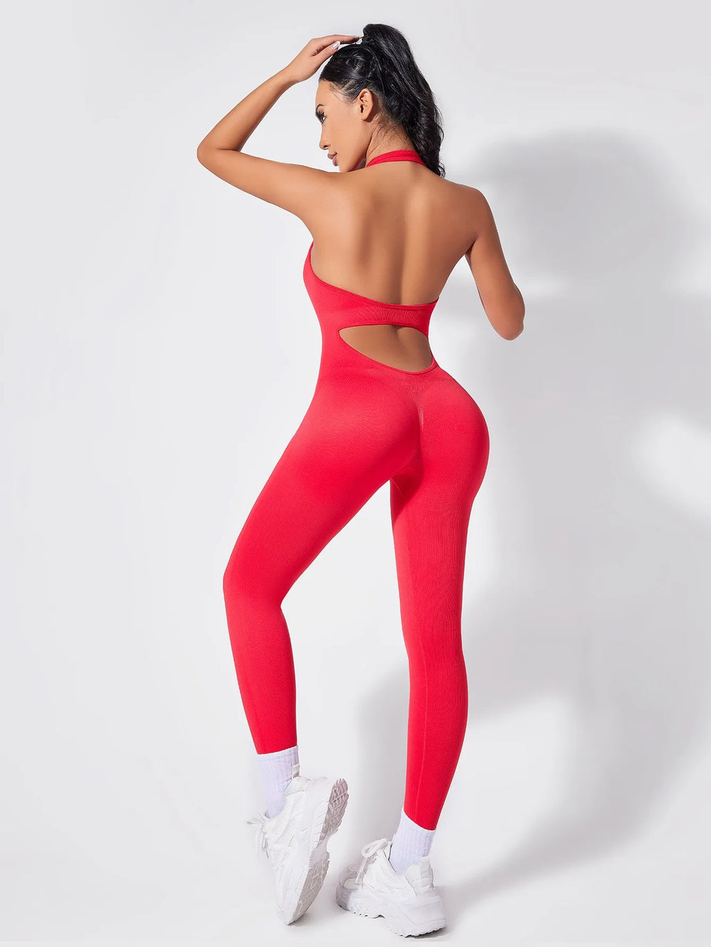 Ladies Vibrant Red Backless Hanging Neck Jumpsuit for Fitness and Fashionable Daily Wear