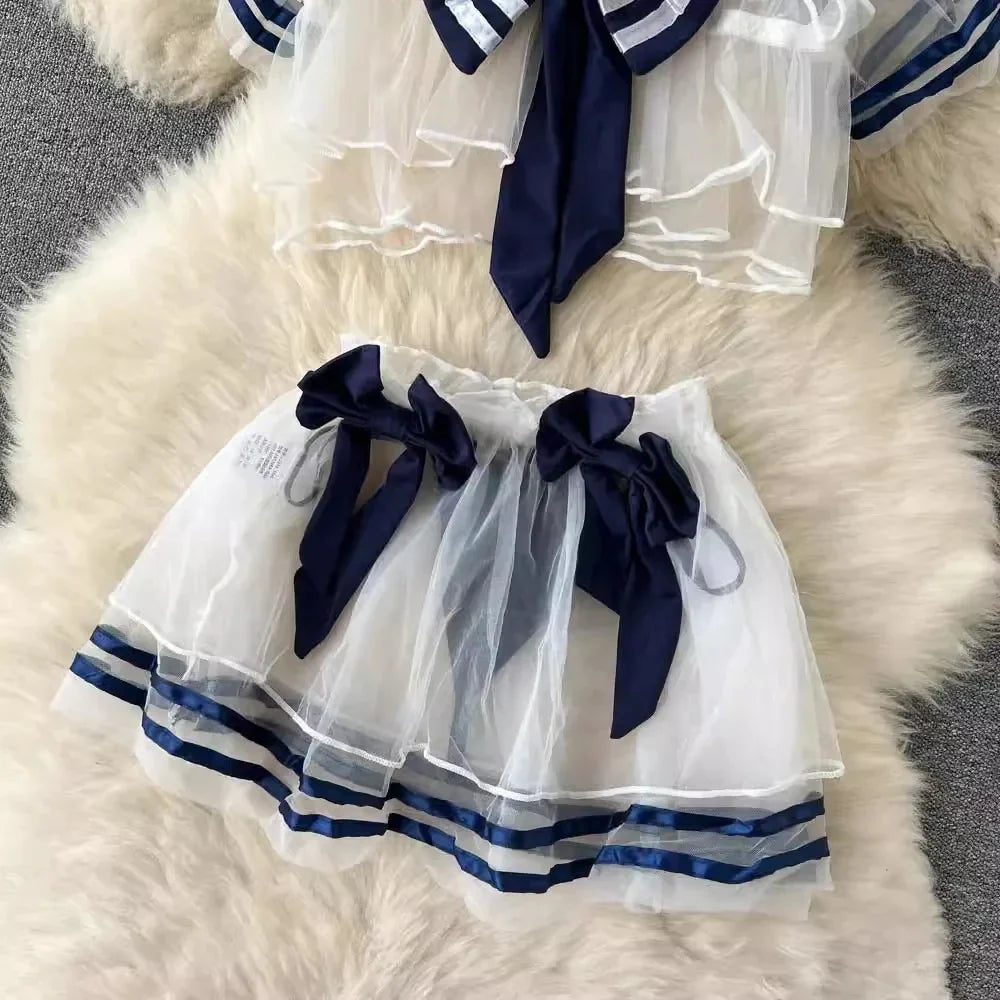 Women's Sexy Transparent Sailor Student Uniform Cosplay Costume Sheer Bowknot Stripe Patchwork Top with Mini Skirt Two-Piece Set
