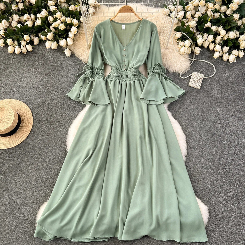 Elegant Pleated Maxi Dress for Women with V-Neck Flare Sleeves and Ruffled Details in Vibrant Purple Green or Red Perfect for Summer Occasions