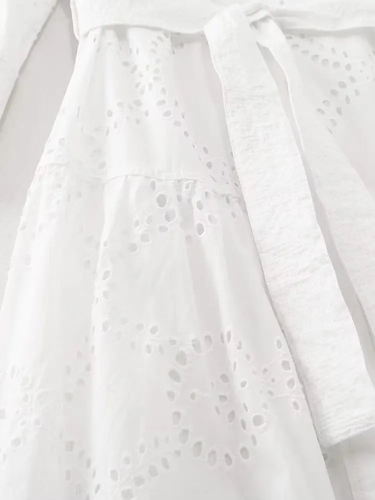 Elegant Embroidered White Maxi Dress for Women with Chic Lapel Long Sleeves High Waist Lace-Up Design and Sheer Hollow Out Details