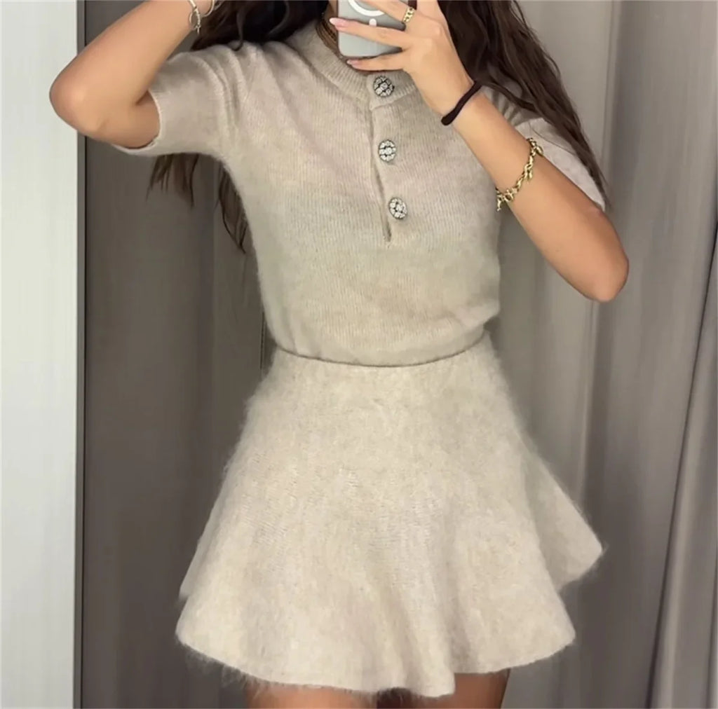 Elegant Knitted Two Piece Mini Skirt Set for Women with O Neck Short Sleeve Top and High Waist Skirt Perfect for Autumn Fashion