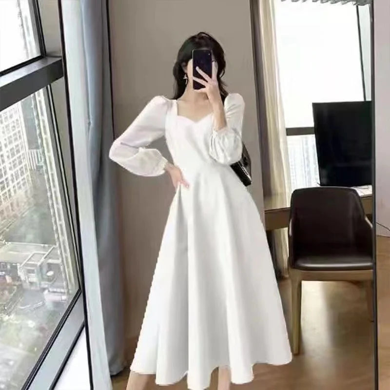 Elegant Long Puff Sleeve Solid Dress for Women with High Waist Fit Perfect for Wedding Guests Evening Parties and Special Occasions